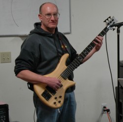Lenny Gemar playing Schecter 5-string bass with the Fully-Covered Band, Feb 2006